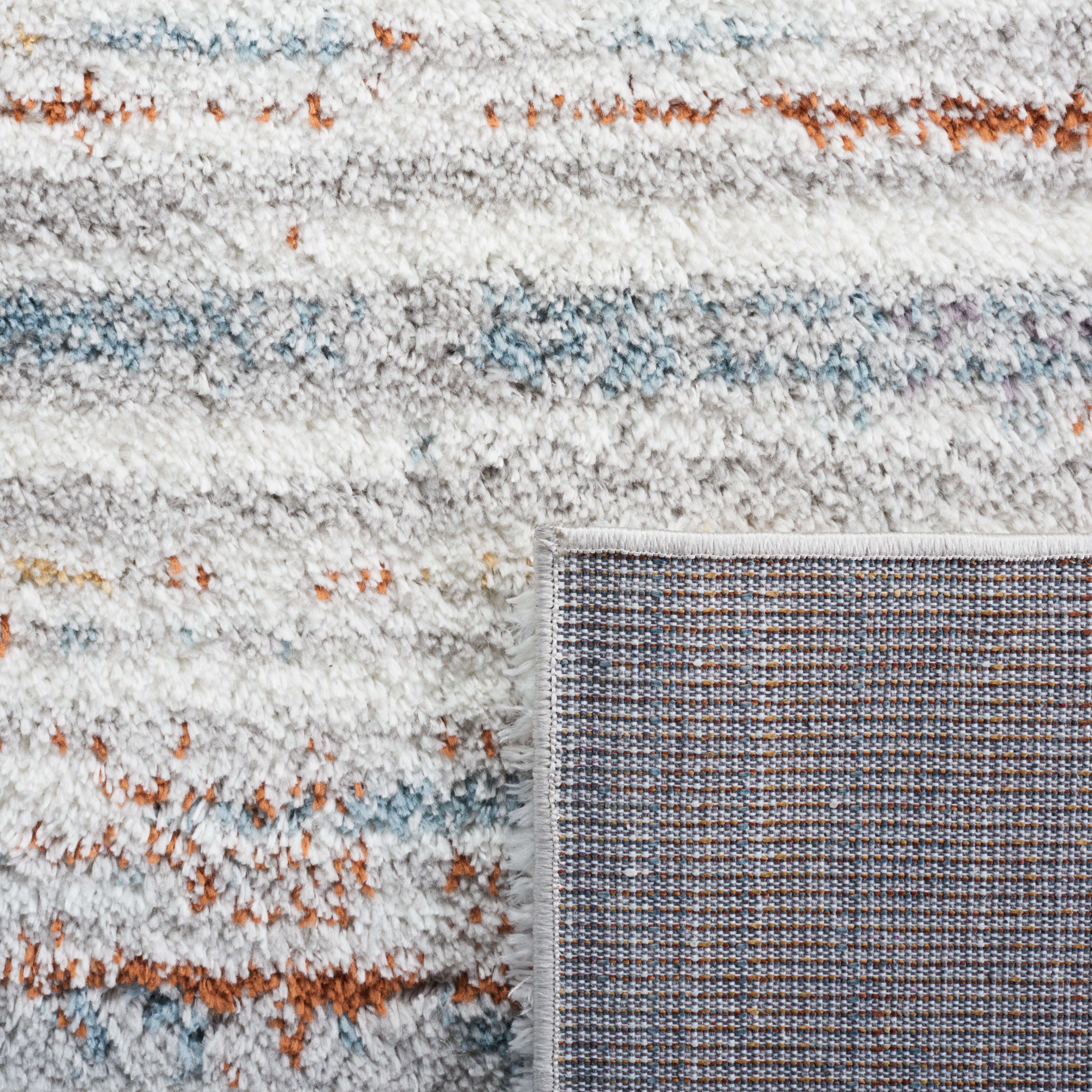 BERBER SHAG 565 – BLUE RUST / IVORY