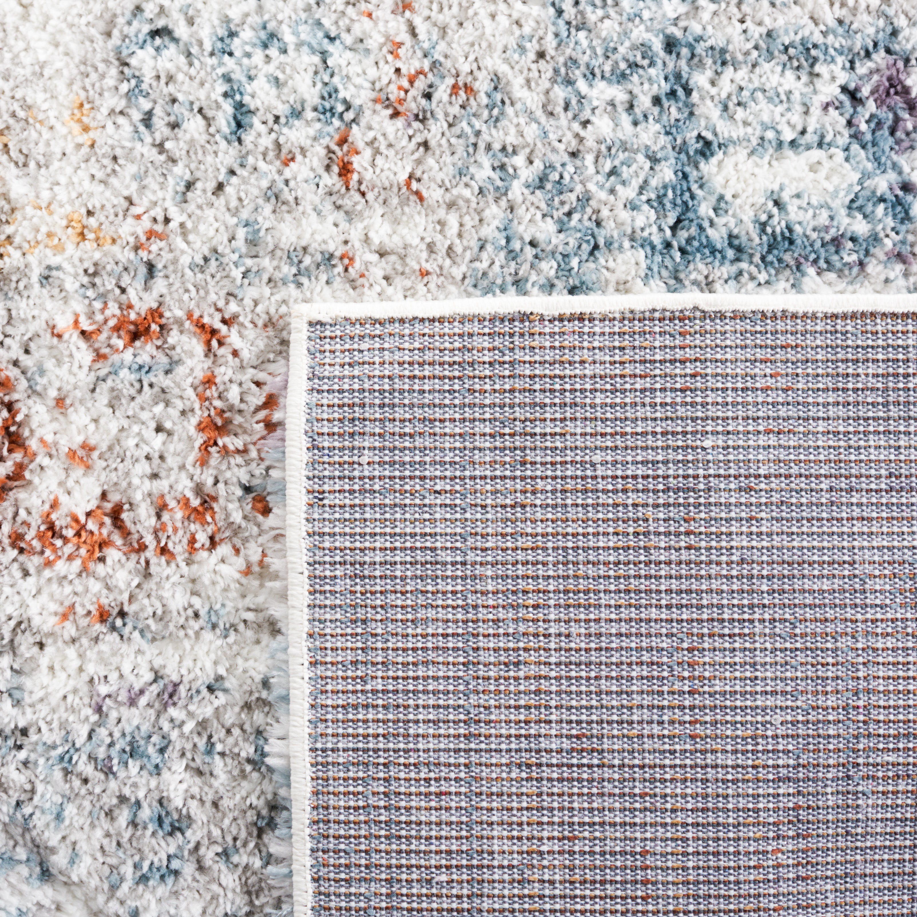 BERBER SHAG 569 – BLUE RUST / IVORY
