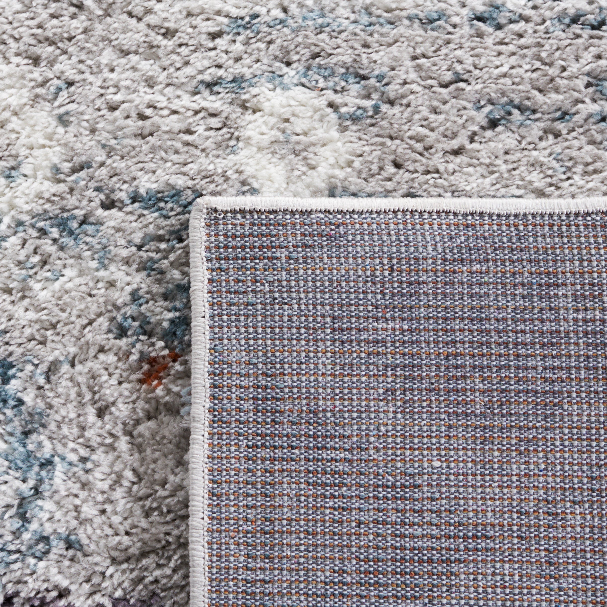 BERBER SHAG 585 – BLUE RUST / IVORY
