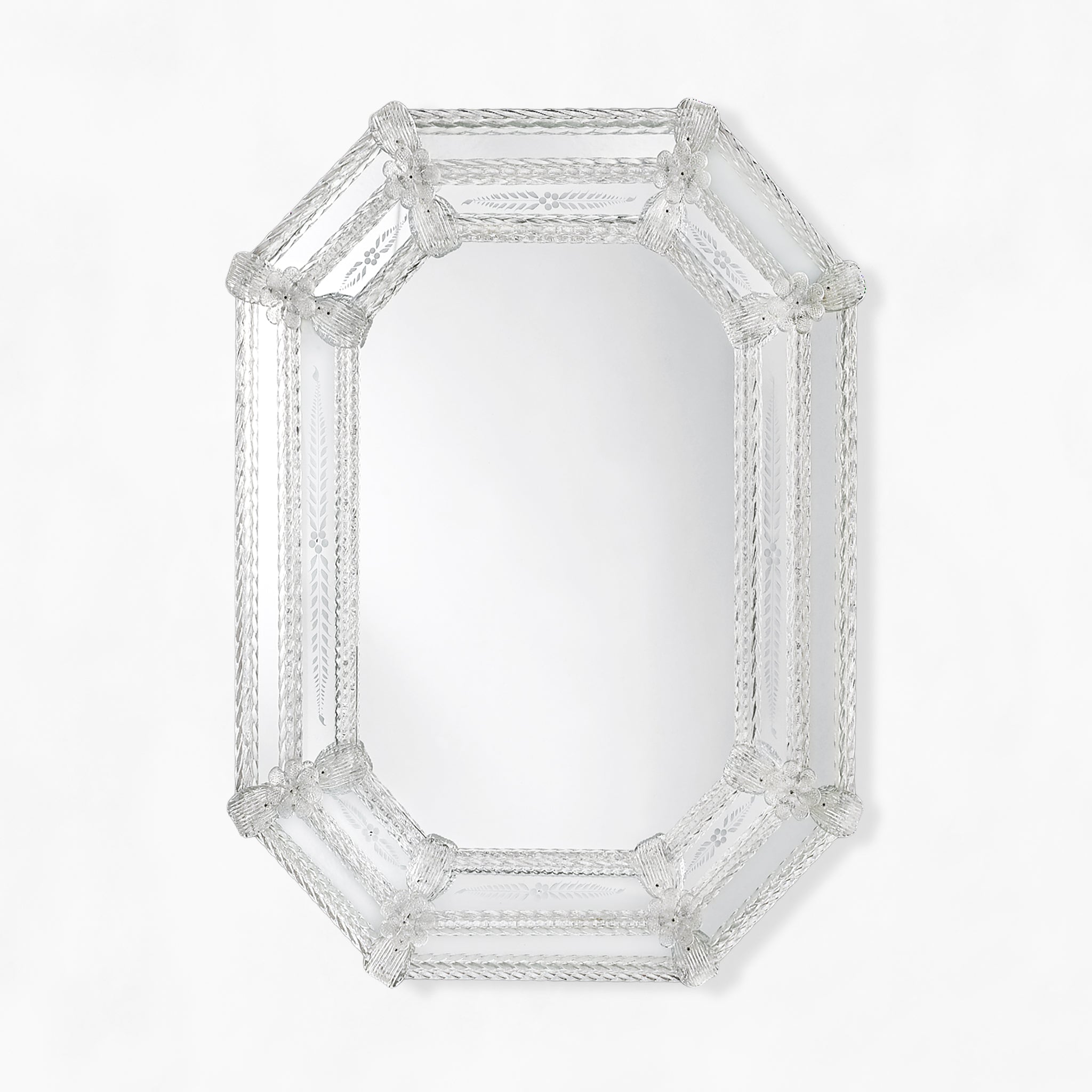 Clear octagonal Murano glass mirror with etched design.