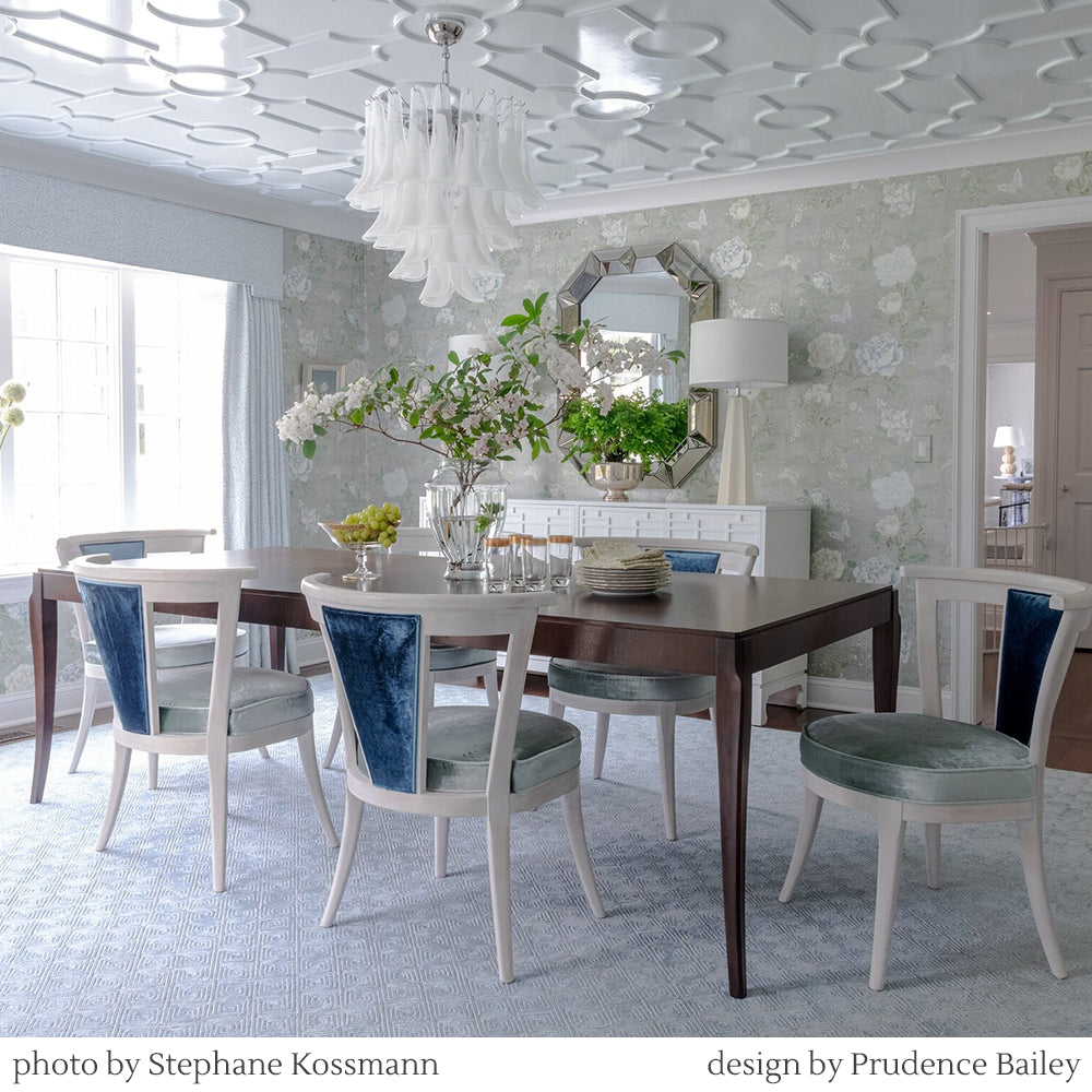 White Murano glass chandelier in formal dining room.