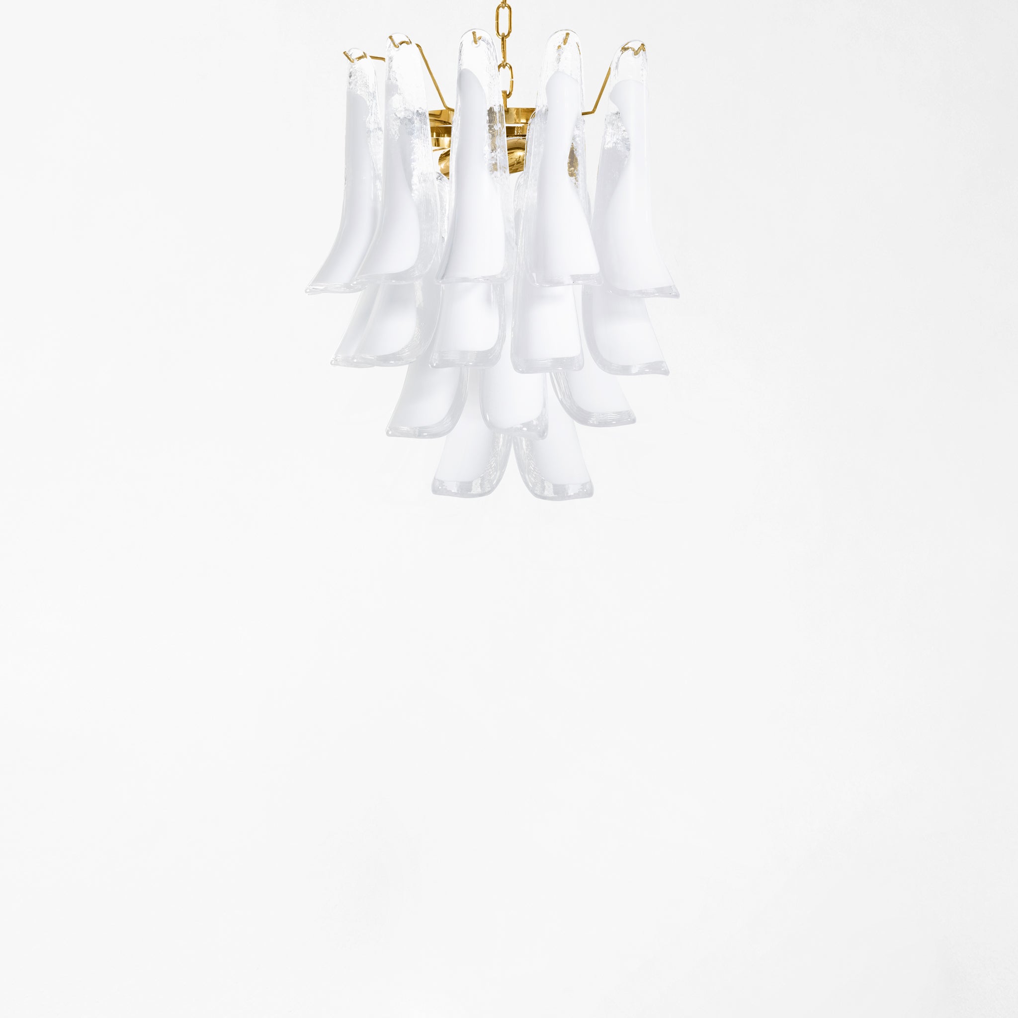 Clear and white Murano glass chandelier with gold hardware.