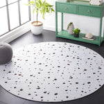 Safavieh Faux Hide 502 Rug, FAH502 - Ivory / Black