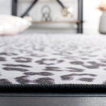 Safavieh Faux Hide 505 Rug, FAH505 - Ivory / Black