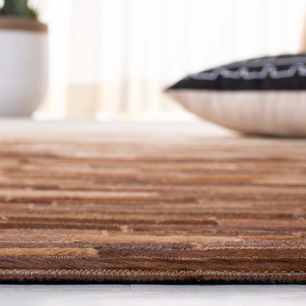 Safavieh Studio Leather 805 Rug, STL805 - Ivory / Brown