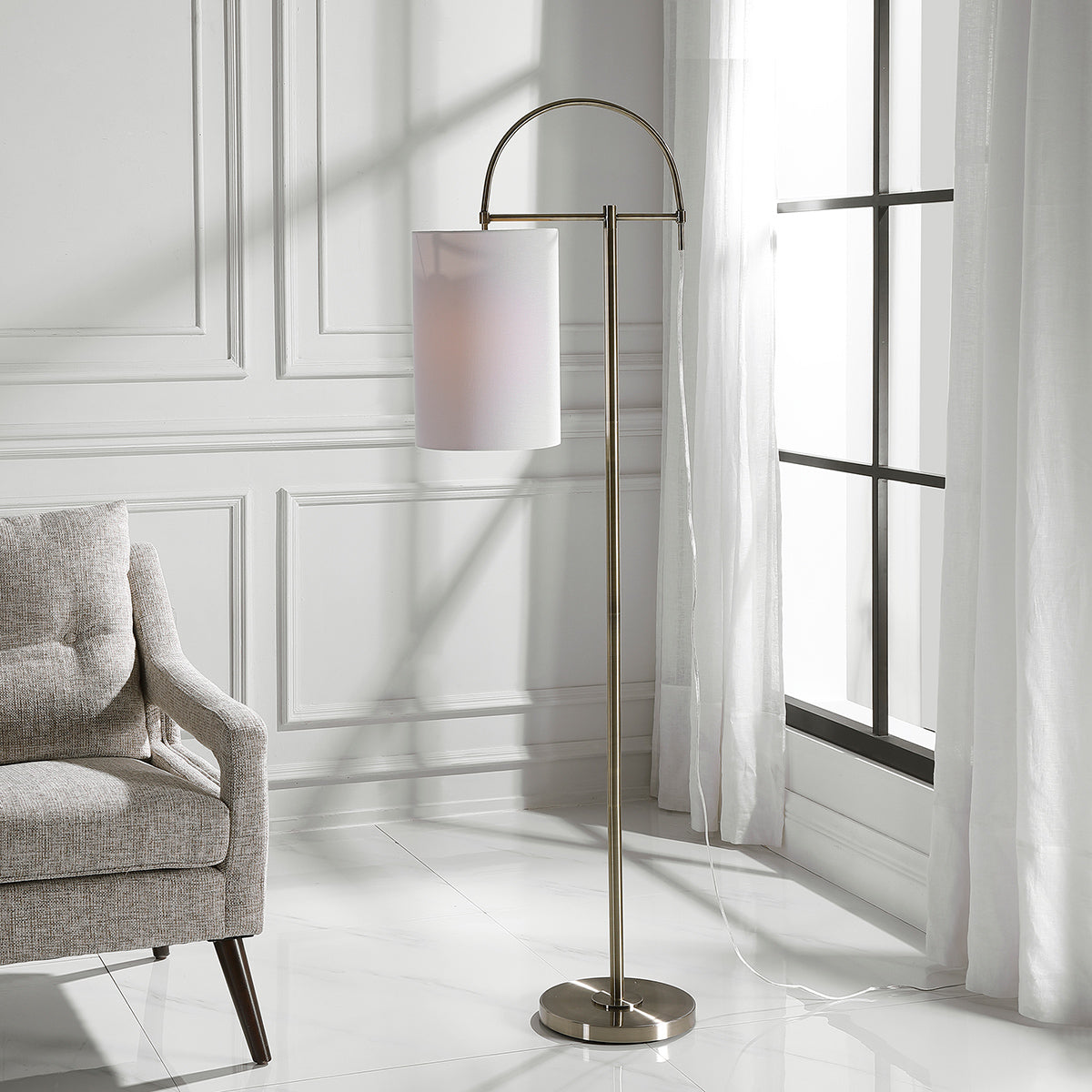 Decor Market Arc Style Base Finished In An Antique Brushed Brass Floor Lamp